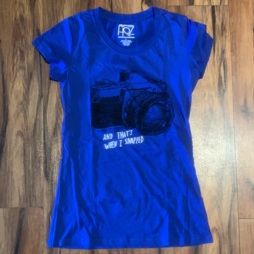 W’s large - blue t-shirt with ‘and that’s when I snapped’ with camera as focus